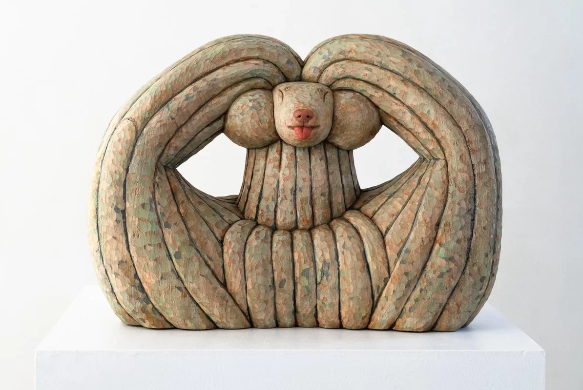 Misato Sano's Whimsical Wooden Dogs Showcase Unique Personalities