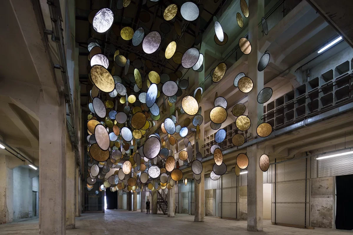 Suspended 'Halos' Illuminate a Florentine Factory