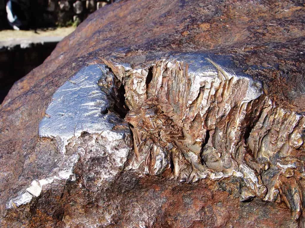 The Mystery of the Hoba Meteorite: Why It Left No Crater