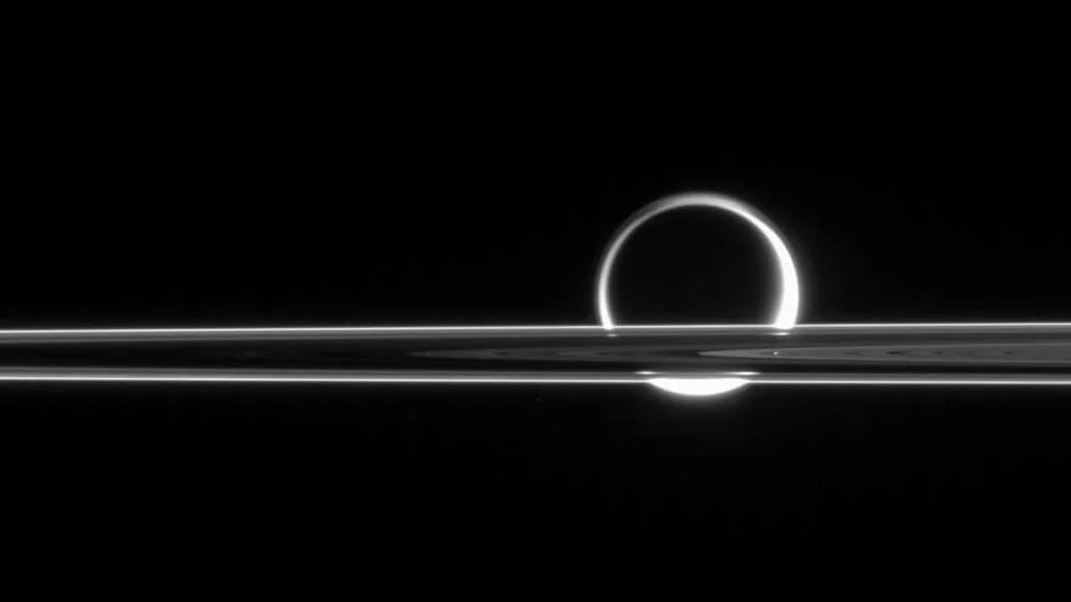 Saturn's Rings May Have Originated from a Collision Involving Titan and a Lost Moon