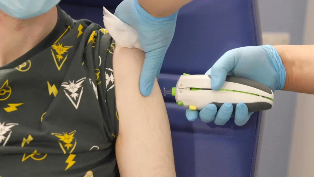 AI-Designed Universal Coronavirus Vaccine Achieves Milestone in Human Trials
