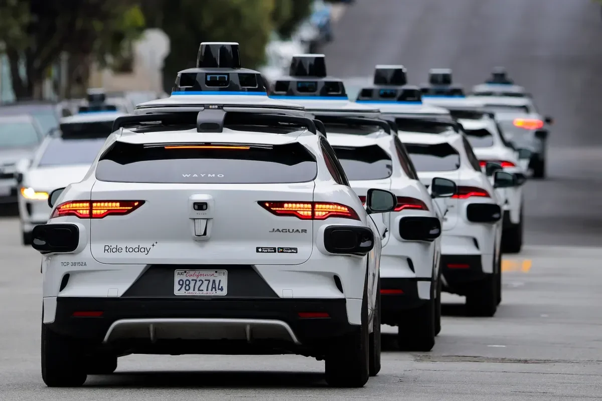 Robotaxi Sector Faces New Safety Pressure as Rivian Raises Fresh Capital